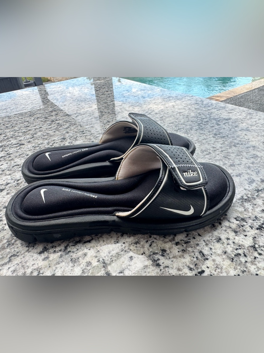 Nike Black and White women’s Adjustable Slide Sandals